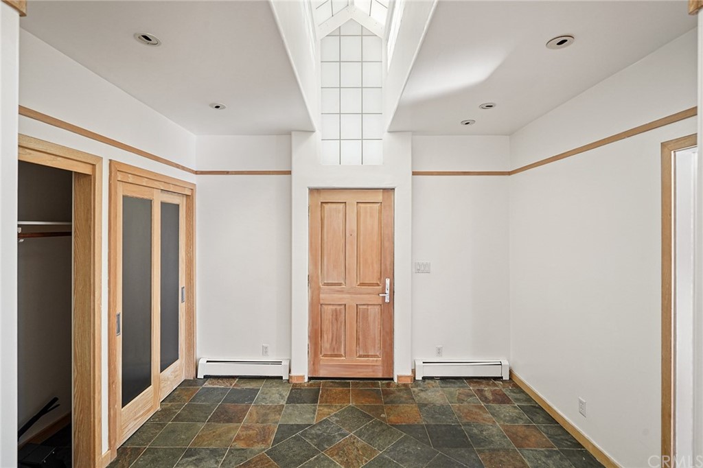 95 Hiller Drive Oakland, CA 94618 - Photo 13 of 58 Entry to home (foyer) with magnificent custom skylight!