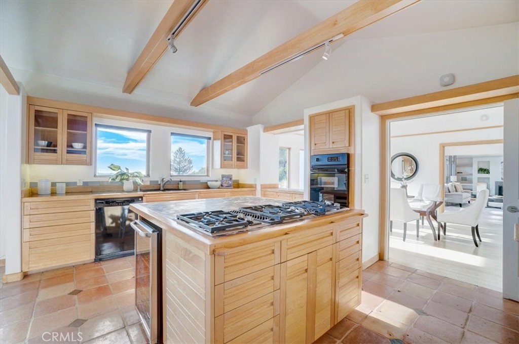 95 Hiller Drive Oakland, CA 94618 - Photo 15 of 58 View from kitchen into dining area/living room