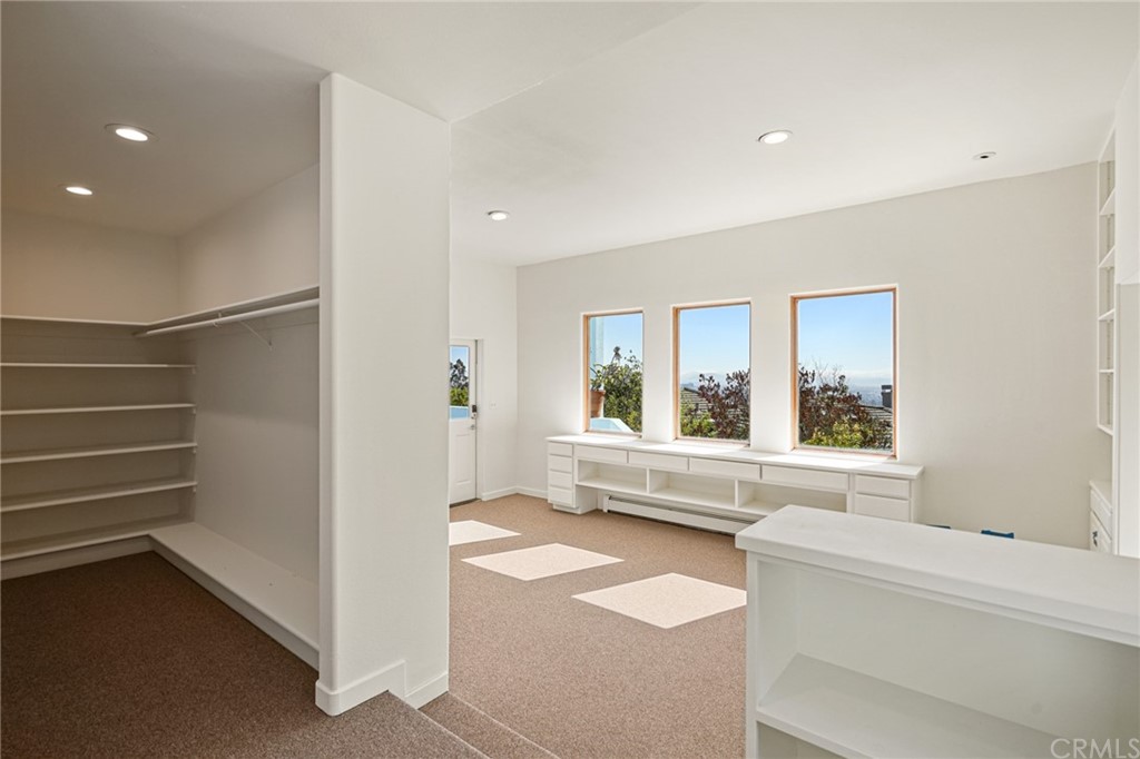 95 Hiller Drive Oakland, CA 94618 - Photo 25 of 58 Entry to ground level primary bedroom #1