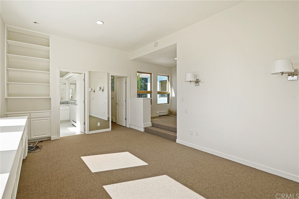 95 Hiller Drive Oakland, CA 94618 - Photo 26 of 58 Primary bedroom #1 ground floor. View of bedroom and adjacent study