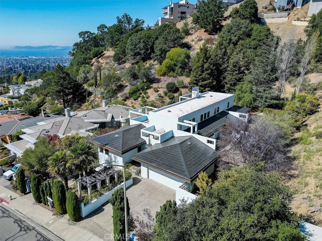 95 Hiller Drive Oakland, CA 94618 - Photo 3 of 58 an aerial view of a house with a yard