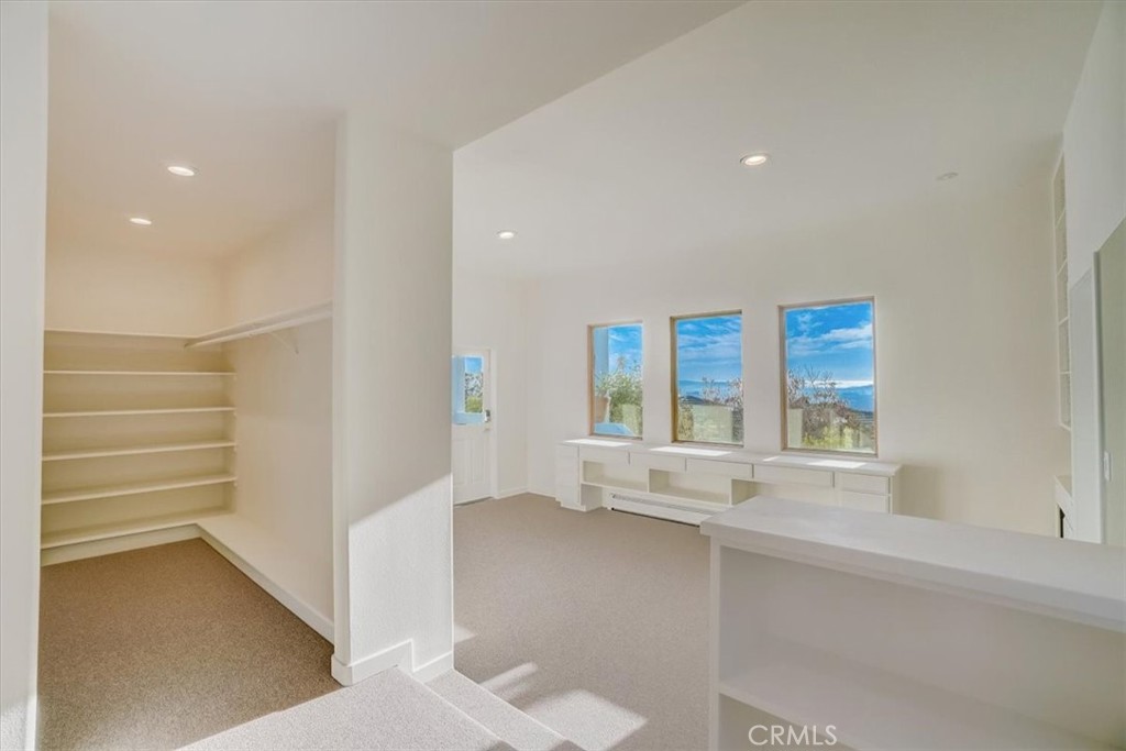 95 Hiller Drive Oakland, CA 94618 - Photo 33 of 58 a view of an empty room with a window