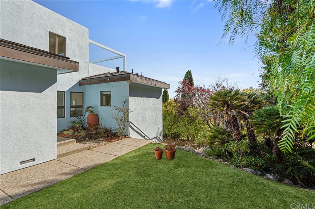 95 Hiller Drive Oakland, CA 94618 - Photo 51 of 58 Side yard towards back of house and entering gardens