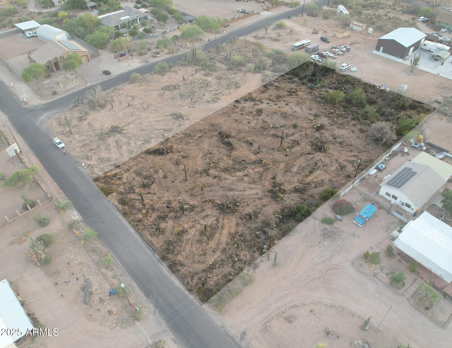 0 North Delaware Drive Apache Junction, AZ 85120 - Photo 17 of 18 a view of a dry yard with wooden fence