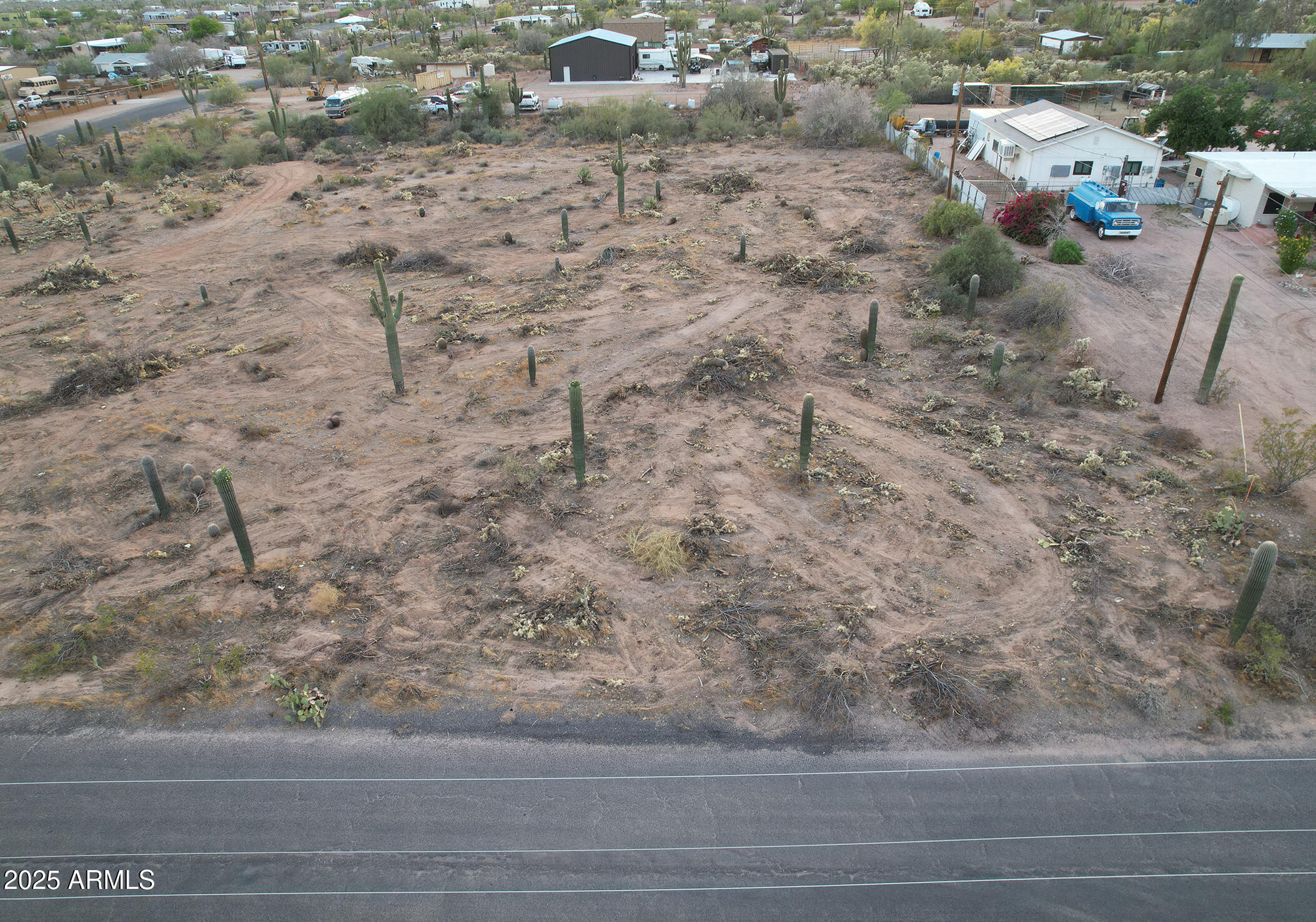0 North Delaware Drive Apache Junction, AZ 85120 - Photo 18 of 18 a view of a dry yard with wooden fence