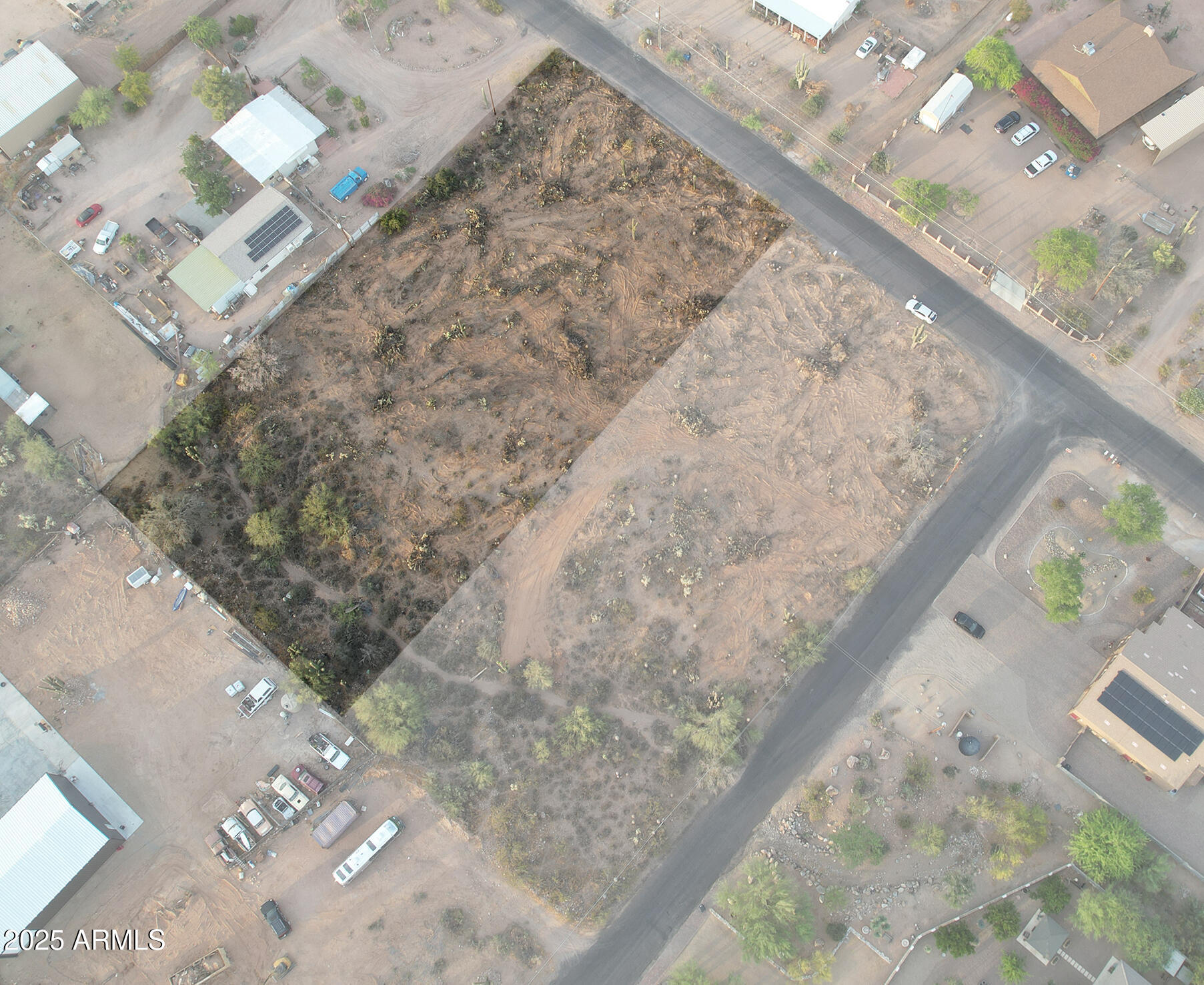 0 North Delaware Drive Apache Junction, AZ 85120 - Photo 9 of 18 a view of a wooden floor with a bench in living room