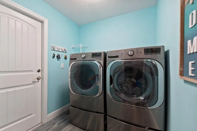 a view of outdoor space with deck and yard