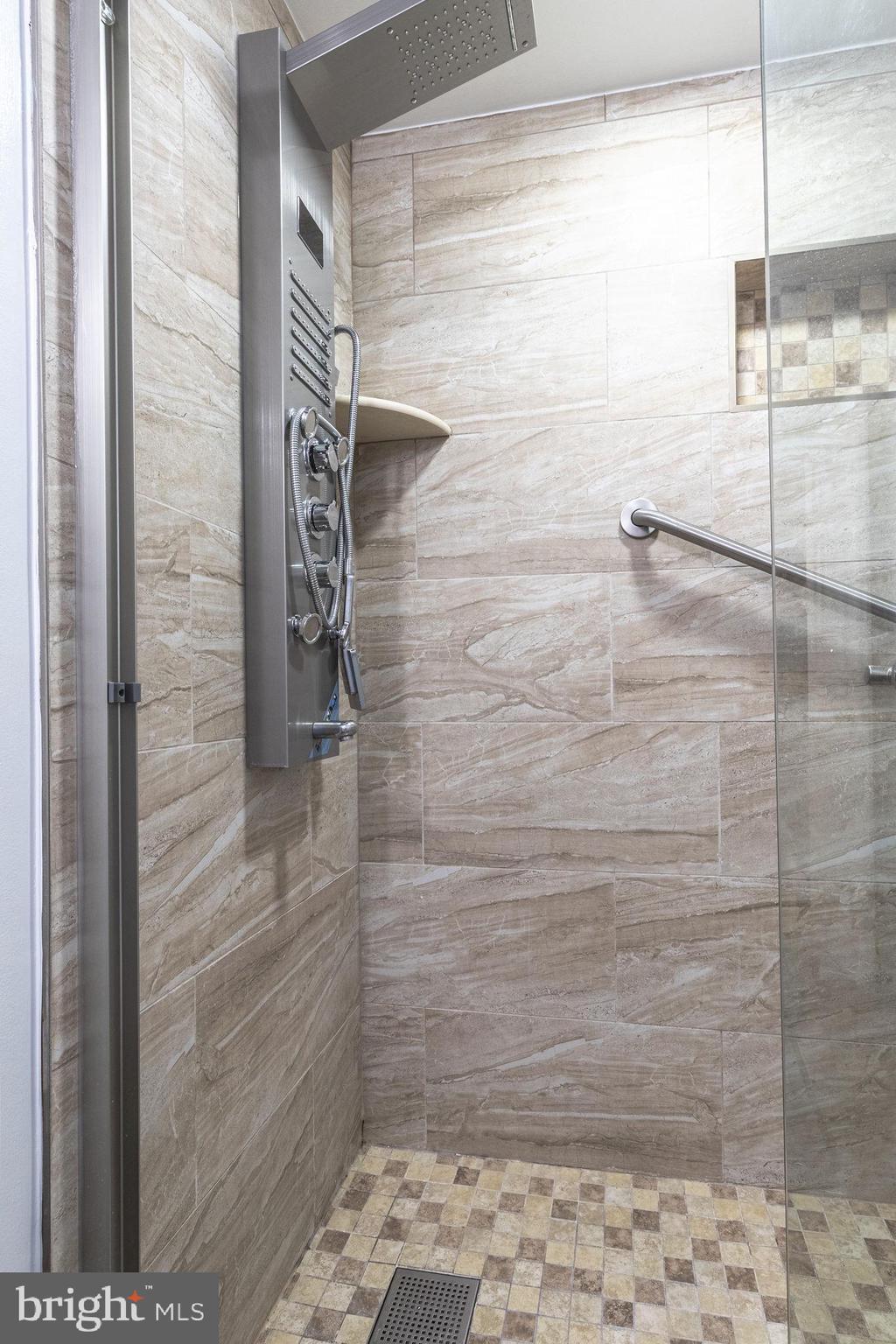 8764 Cold Plain Court Springfield, VA 22153 - Photo 15 of 24 a bathroom with a shower