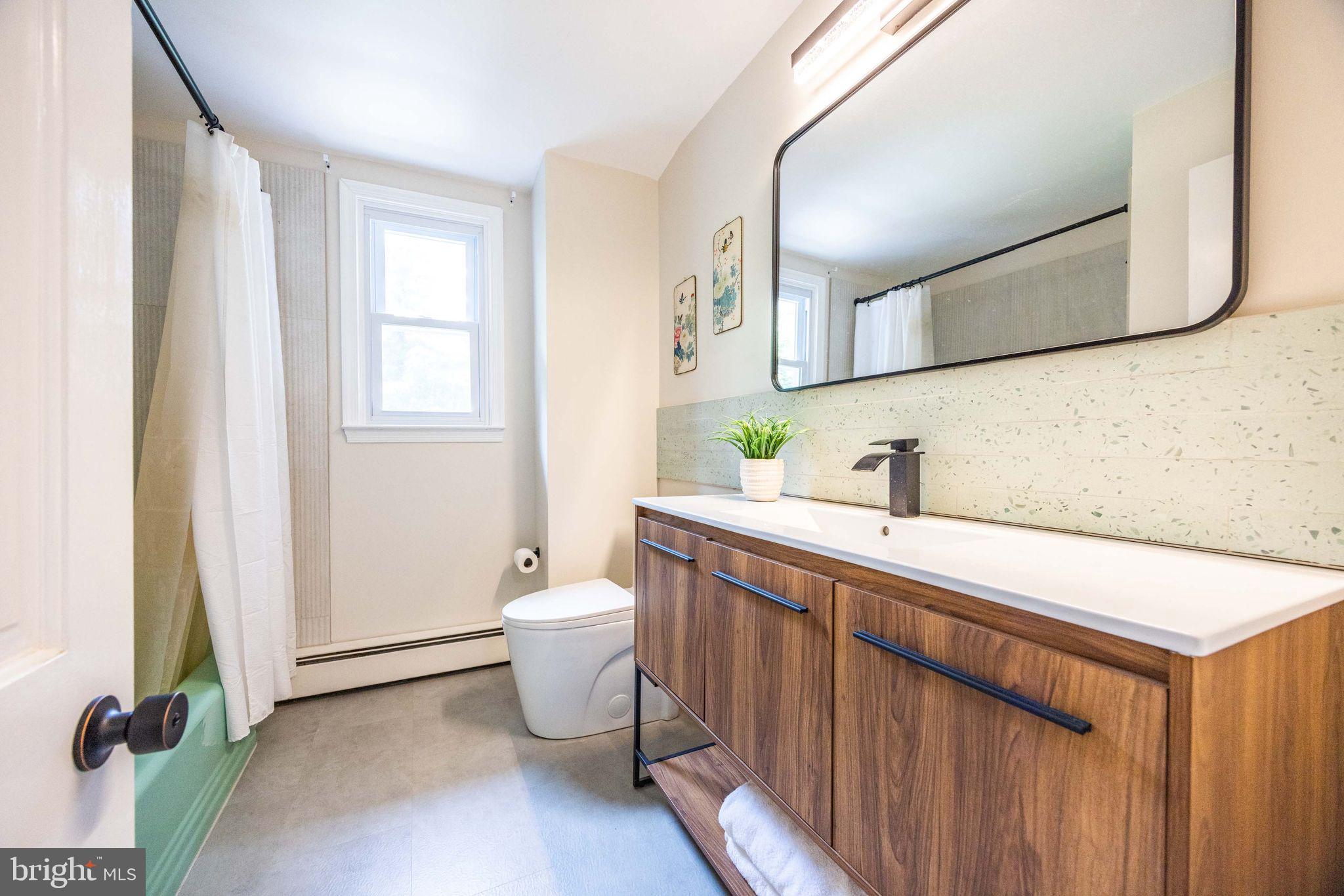 30 Well Fleet Road Media, PA 19063 - Photo 34 of 37 Hall bath with updated vanity and fixtures