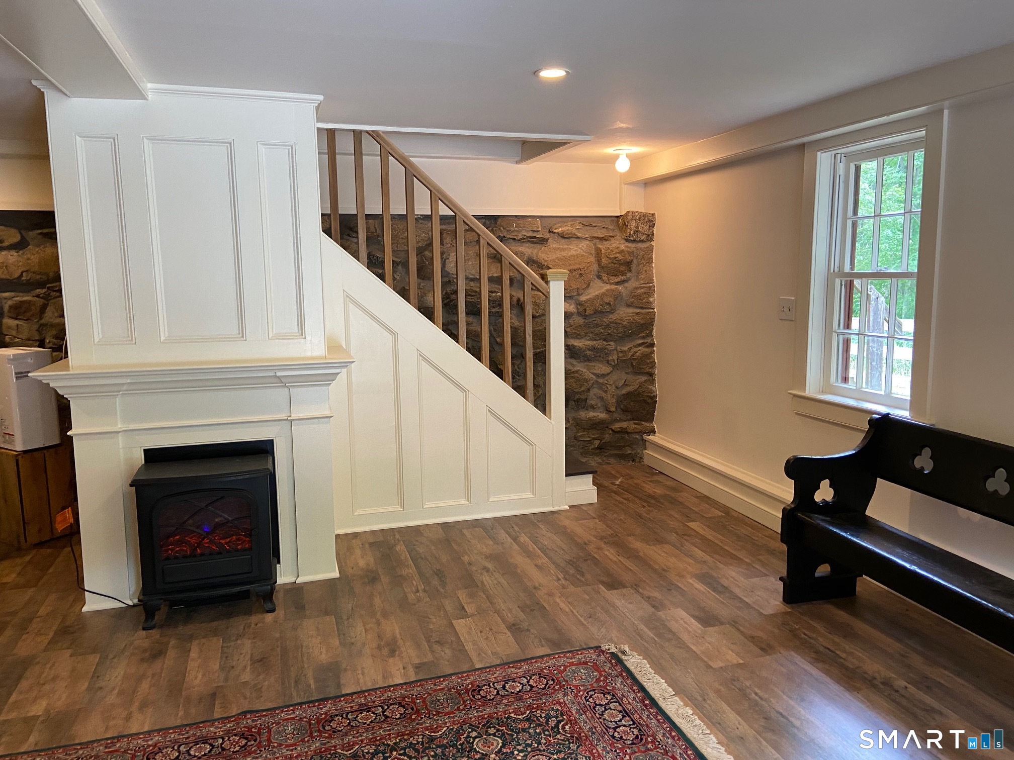 95 R Saybrook Road Essex, CT 06426 - Photo 5 of 17 Tavern Room. Staircase to next level Living Room & Kitchen.