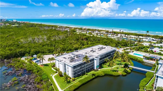 a view of a balcony with an ocean