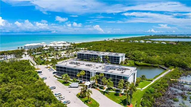 a view of a city with ocean view