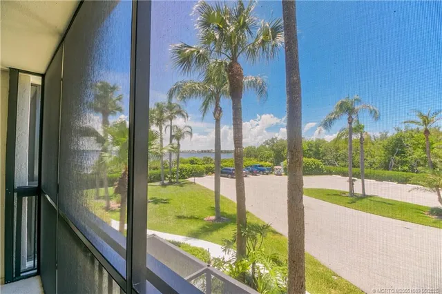 a view of swimming pool from a window