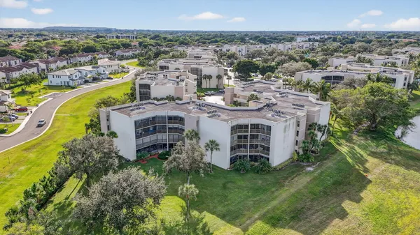 an aerial view of a house with a garden