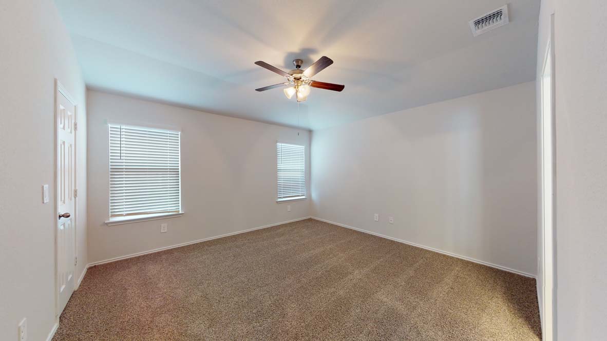 401 Creekfall Road Burnet, TX 78611 - Photo 9 of 23 a view of an empty room with a window