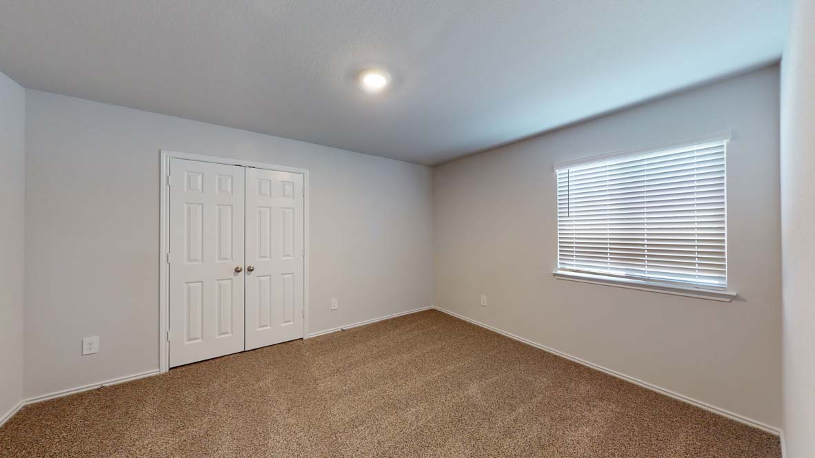 401 Creekfall Road Burnet, TX 78611 - Photo 14 of 23 a view of an empty room with a window
