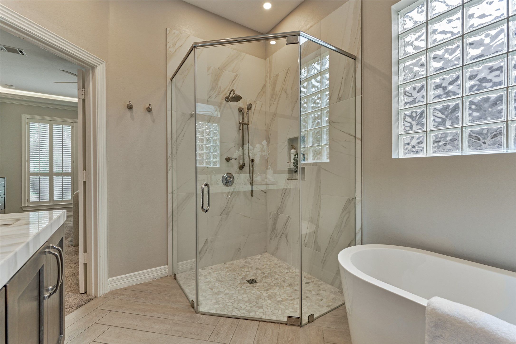 7 Gentry Oak Court Spring, TX 77381 - Photo 28 of 50 a bathroom with a shower and a sink