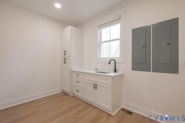 a view of cabinets and window