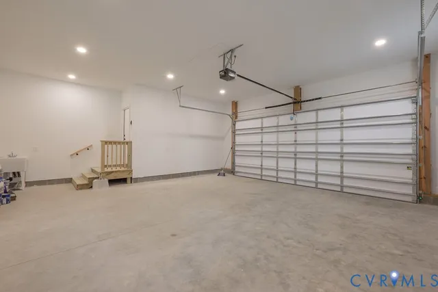 an empty room with a empty space and wooden shelves
