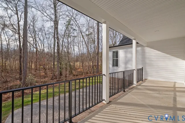 a view of a wooden house with a porch