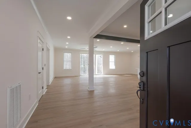 a view of gallery with wooden floor
