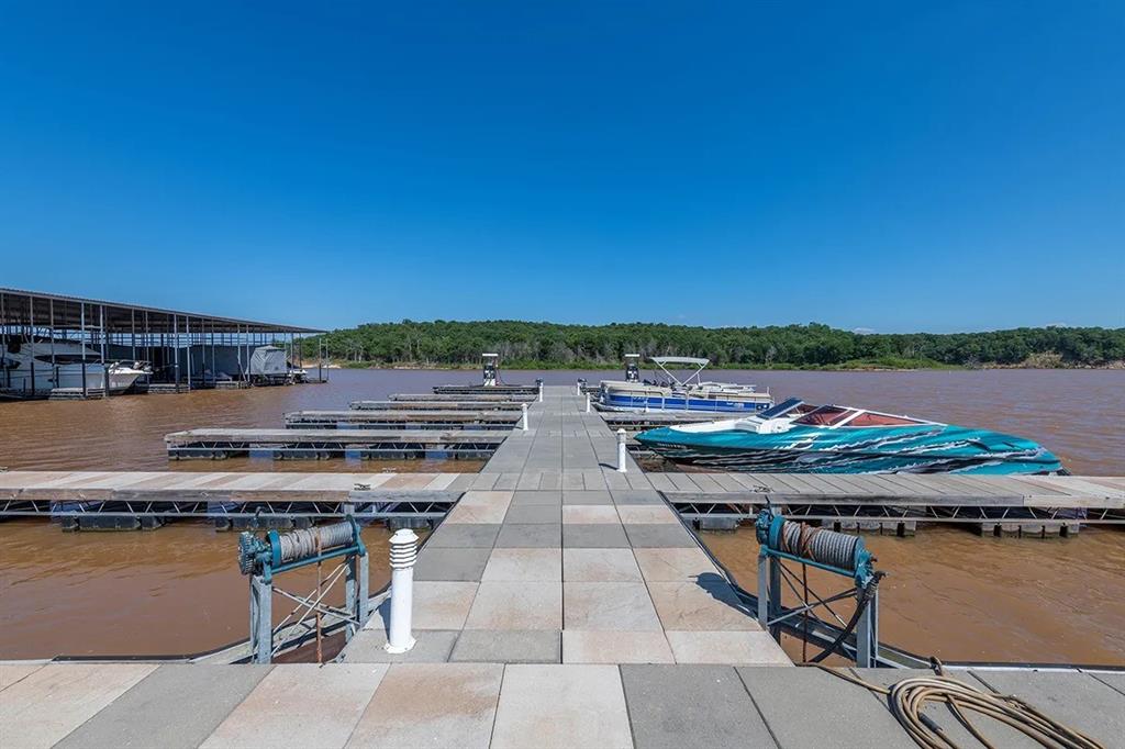 60 Timber Bank Drive Gordonville, TX 76245 - Photo 18 of 24 a view of a rooftop with lounge chairs