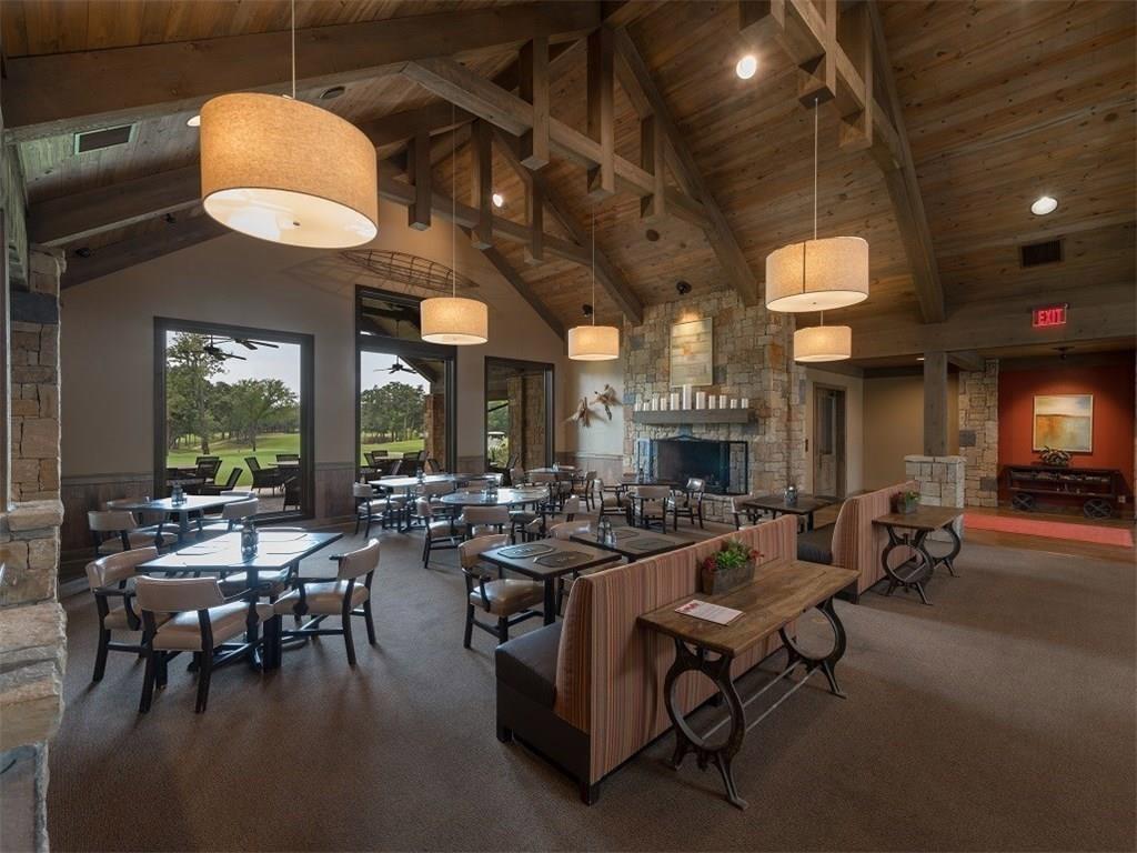 60 Timber Bank Drive Gordonville, TX 76245 - Photo 20 of 24 a living room with fireplace furniture and a large window