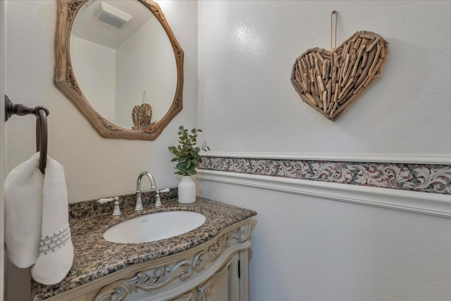 38 Devonshire Avenue, Unit 2 Mountain View, CA 94043 - Photo 14 of 38 a bathroom with a granite countertop sink and a mirror