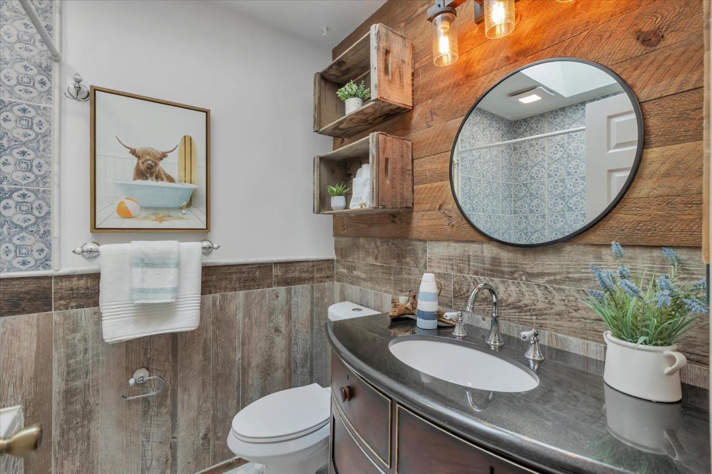 38 Devonshire Avenue, Unit 2 Mountain View, CA 94043 - Photo 23 of 38 a bathroom with a toilet a sink and mirror