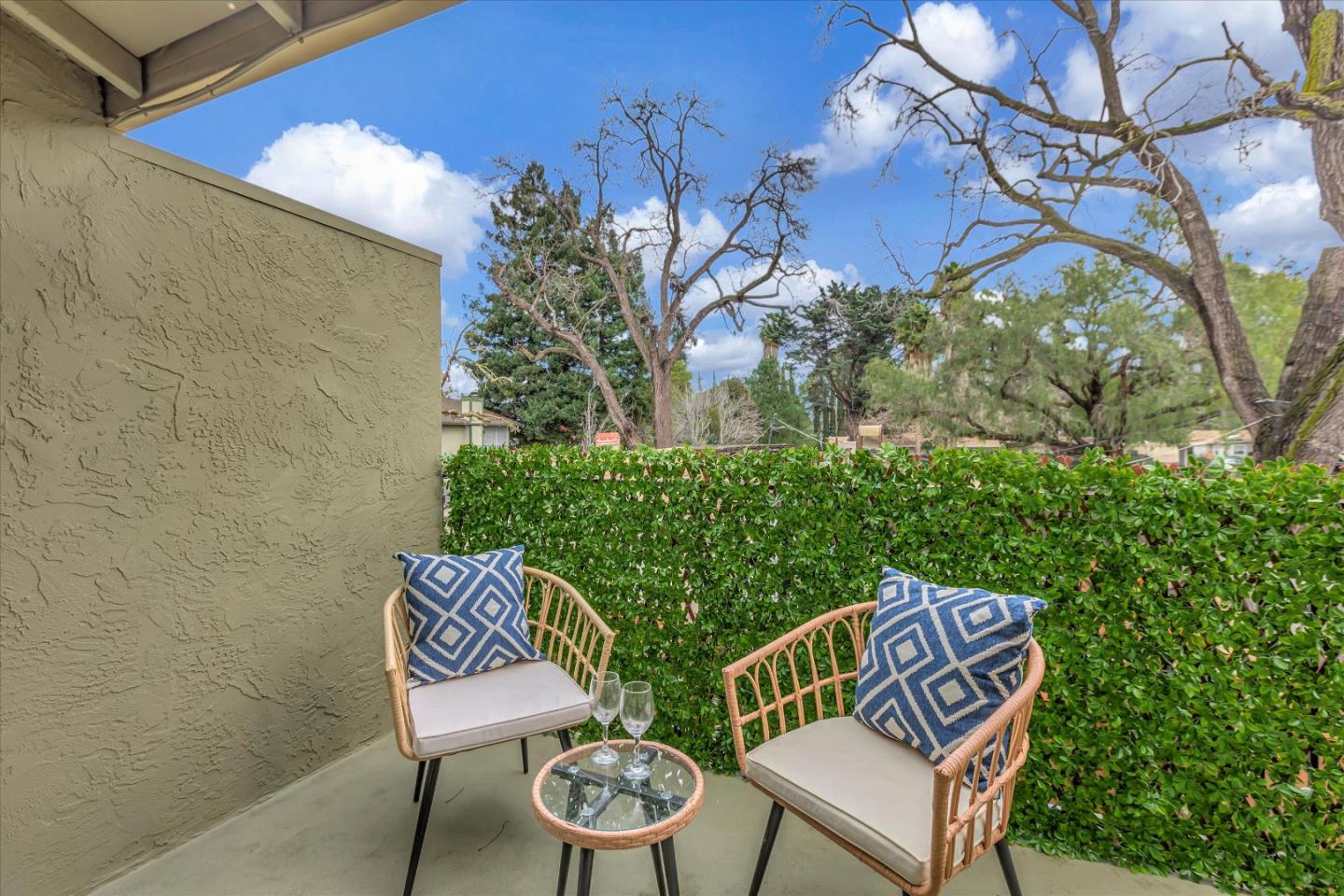 38 Devonshire Avenue, Unit 2 Mountain View, CA 94043 - Photo 26 of 38 a view of a chairs and table in a backyard