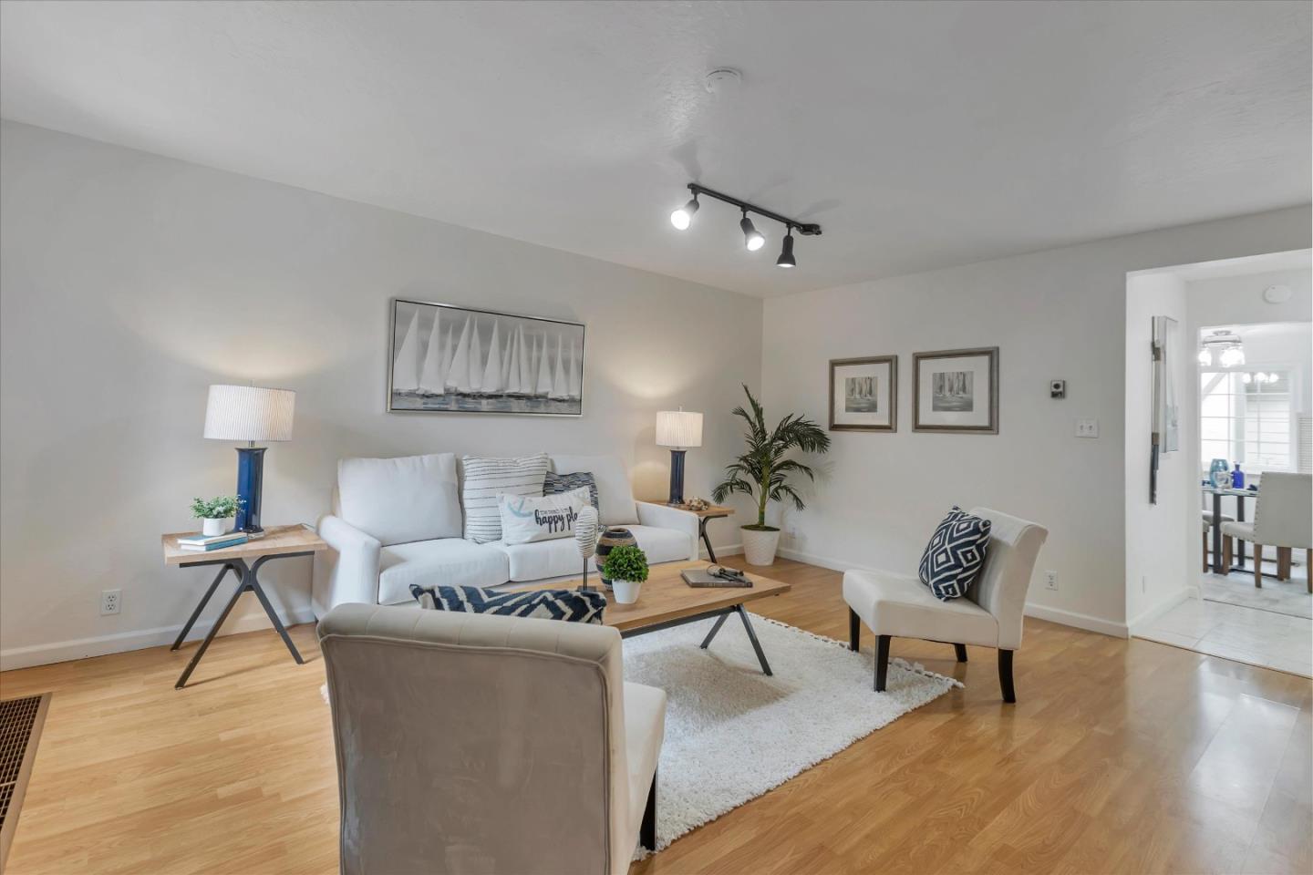 38 Devonshire Avenue, Unit 2 Mountain View, CA 94043 - Photo 3 of 38 a living room with furniture and wooden floor