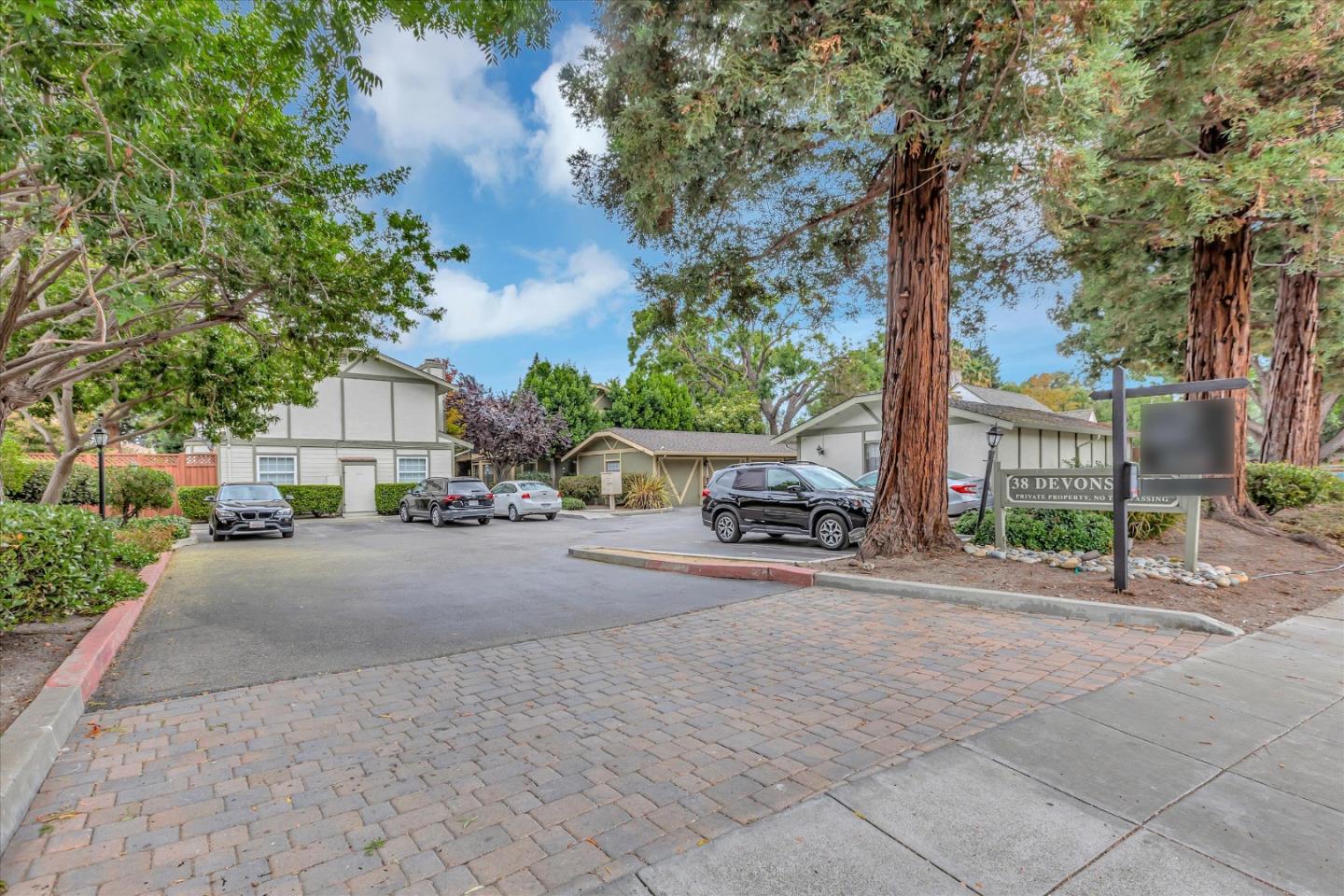 38 Devonshire Avenue, Unit 2 Mountain View, CA 94043 - Photo 33 of 38 a couple of cars parked in front of a house