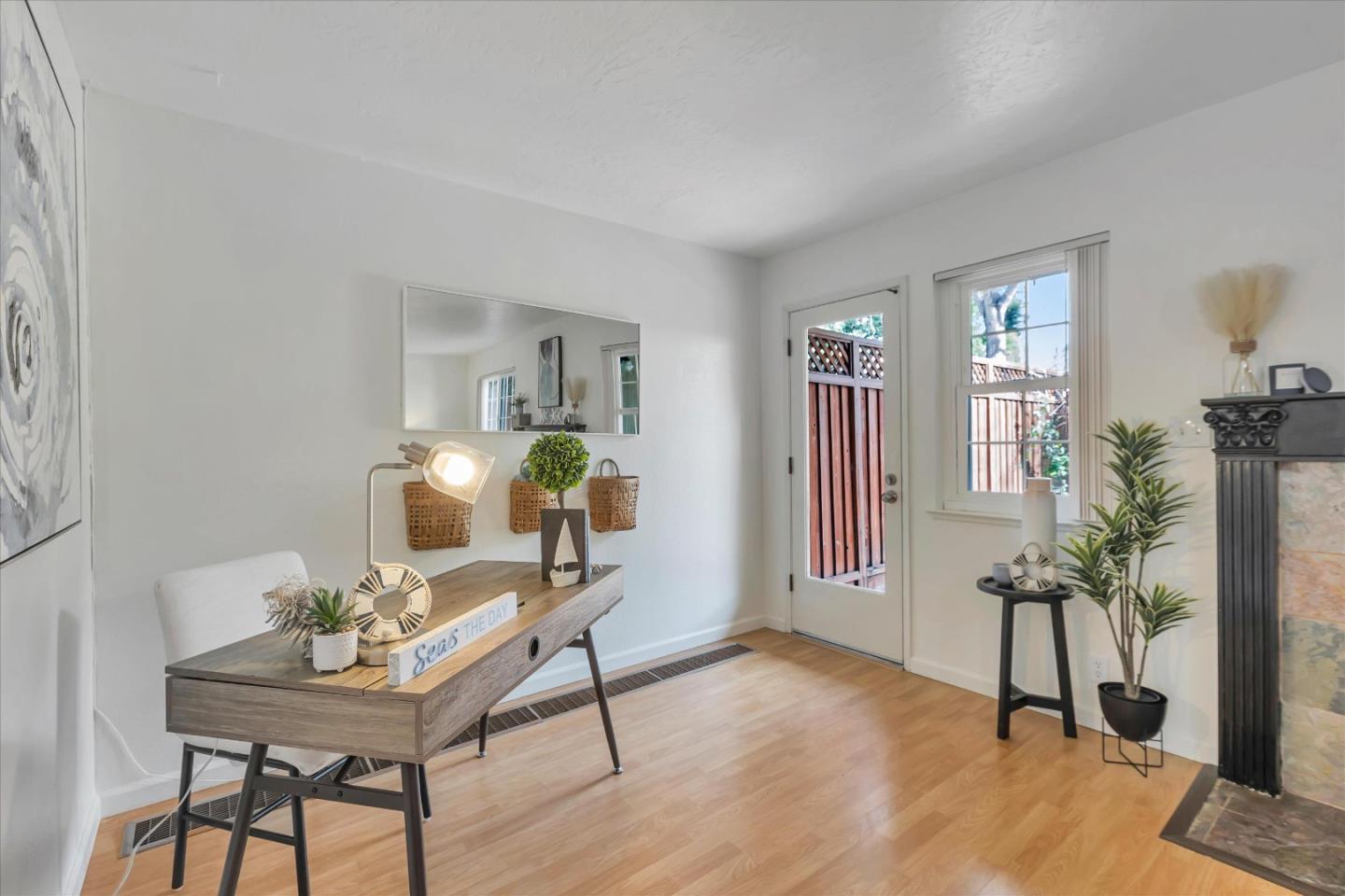 38 Devonshire Avenue, Unit 2 Mountain View, CA 94043 - Photo 6 of 38 a workspace with furniture and a potted plant