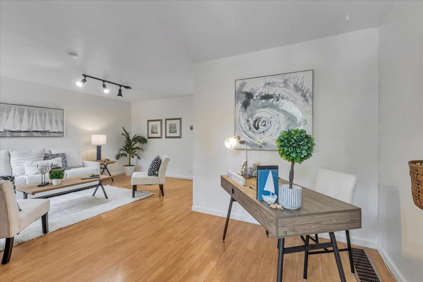 38 Devonshire Avenue, Unit 2 Mountain View, CA 94043 - Photo 7 of 38 a living room with furniture and a potted plant