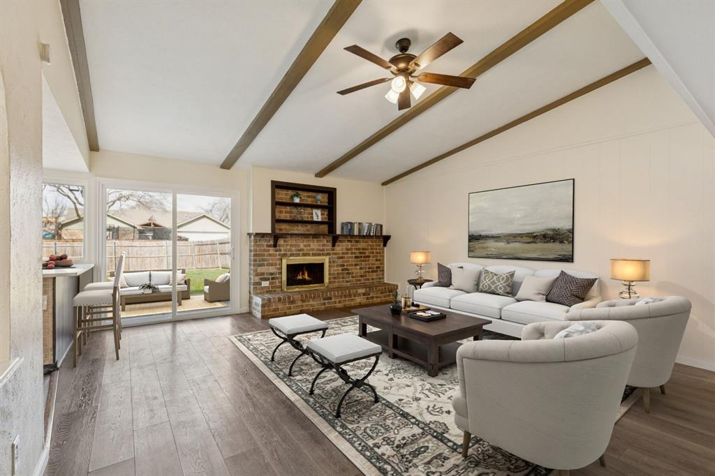 9305 Pollard Street Rowlett, TX 75088 - Photo 13 of 30 a living room with furniture and a large window