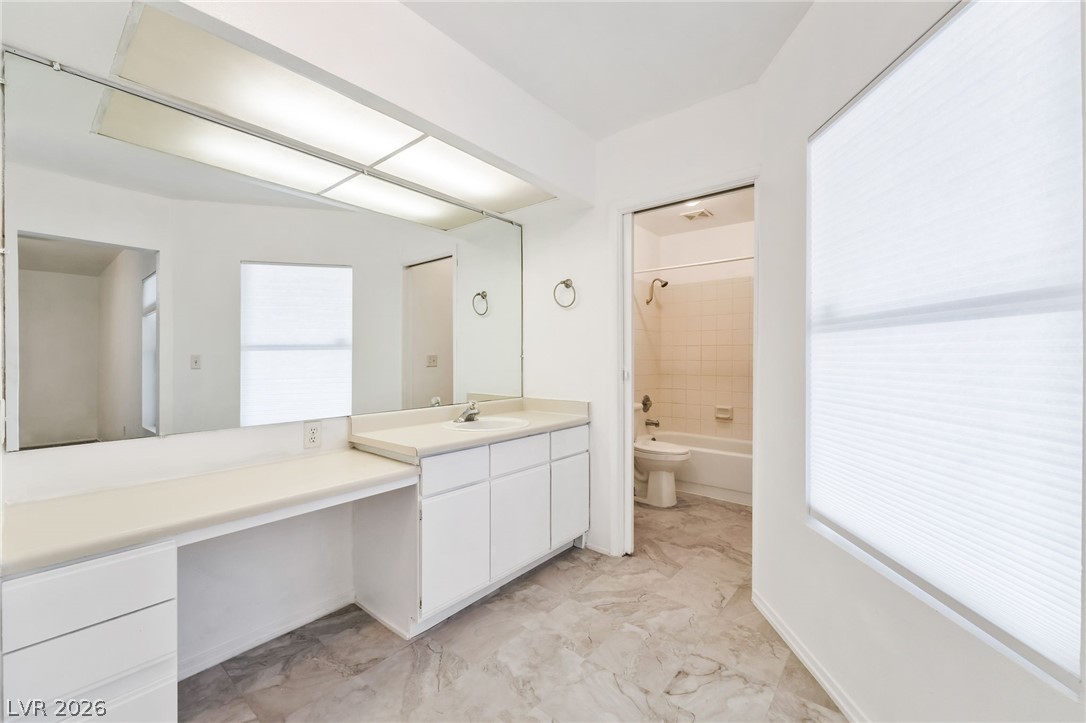 242 Nebraska Avenue Henderson, NV 89015 - Photo 18 of 46 Full bathroom with vanity and tub / shower combination
