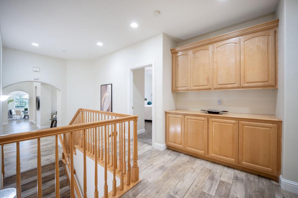 2360 Sunflower Circle Gilroy, CA 95020 - Photo 17 of 49 a kitchen with stainless steel appliances granite countertop a stove a sink and a refrigerator