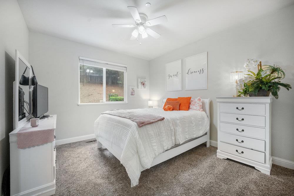 2360 Sunflower Circle Gilroy, CA 95020 - Photo 22 of 49 a bedroom with a bed and a flat screen tv