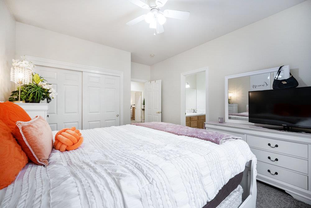 2360 Sunflower Circle Gilroy, CA 95020 - Photo 23 of 49 a bedroom with a bed and a flat screen tv