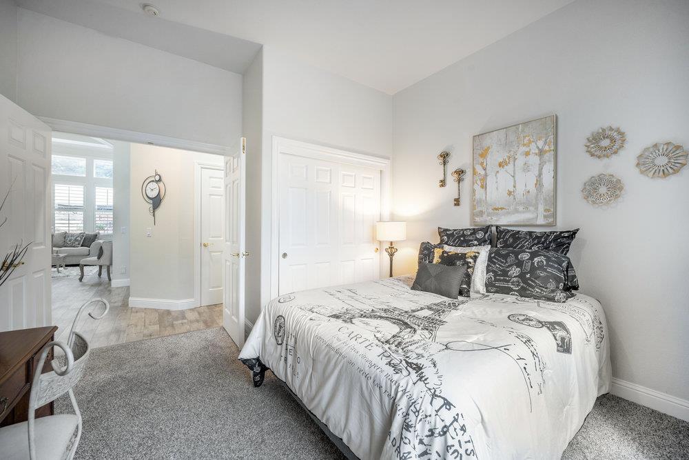 2360 Sunflower Circle Gilroy, CA 95020 - Photo 29 of 49 a bedroom with a bed and a couch