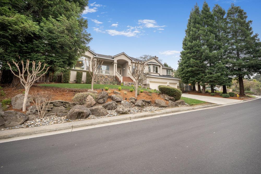 2360 Sunflower Circle Gilroy, CA 95020 - Photo 3 of 49 a view of a house with a yard and pathway