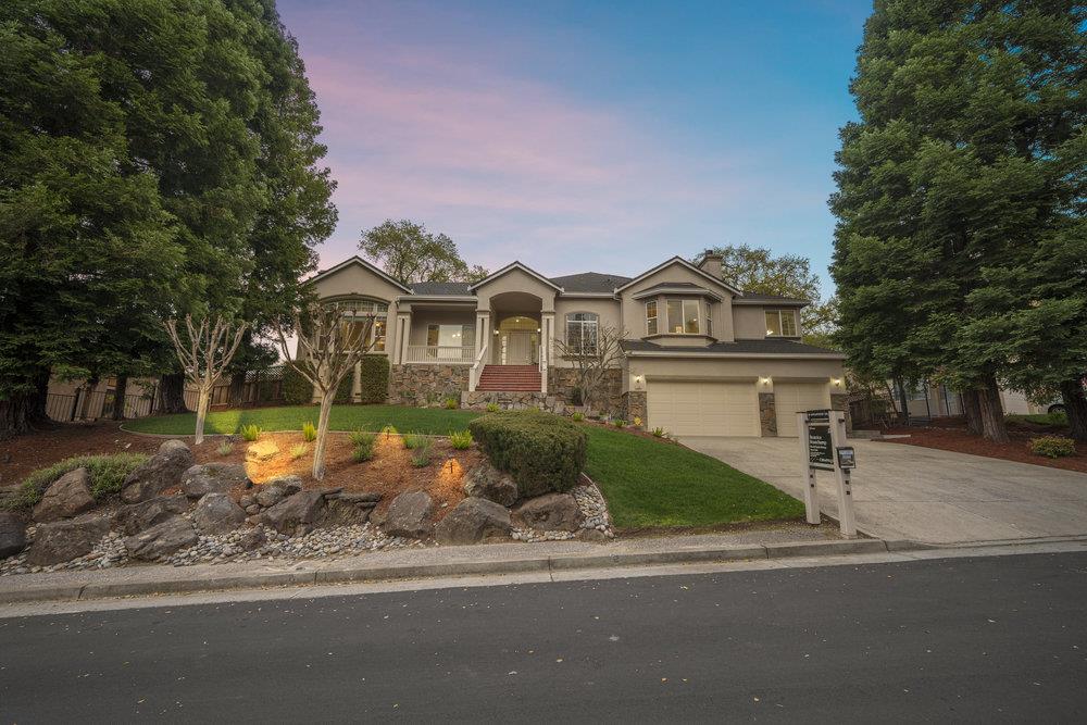 2360 Sunflower Circle Gilroy, CA 95020 - Photo 44 of 49 a front view of a house with a garden and lake view
