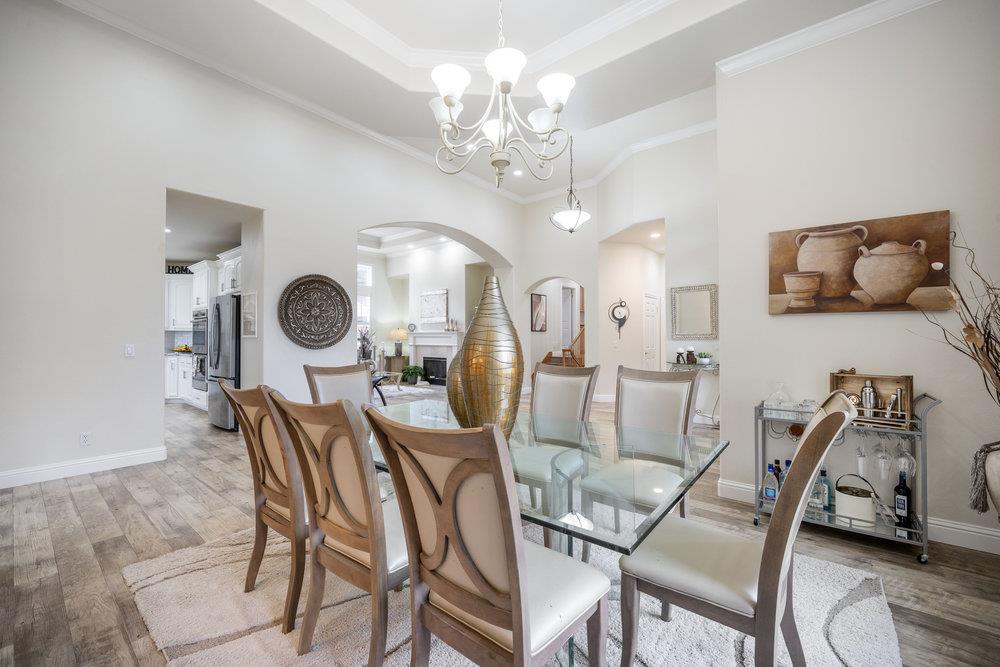 2360 Sunflower Circle Gilroy, CA 95020 - Photo 7 of 49 a view of a dining room with furniture and chandelier