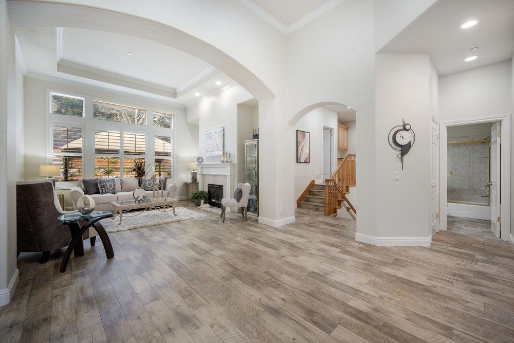 2360 Sunflower Circle Gilroy, CA 95020 - Photo 8 of 49 a living room filled with furniture and a wooden floor