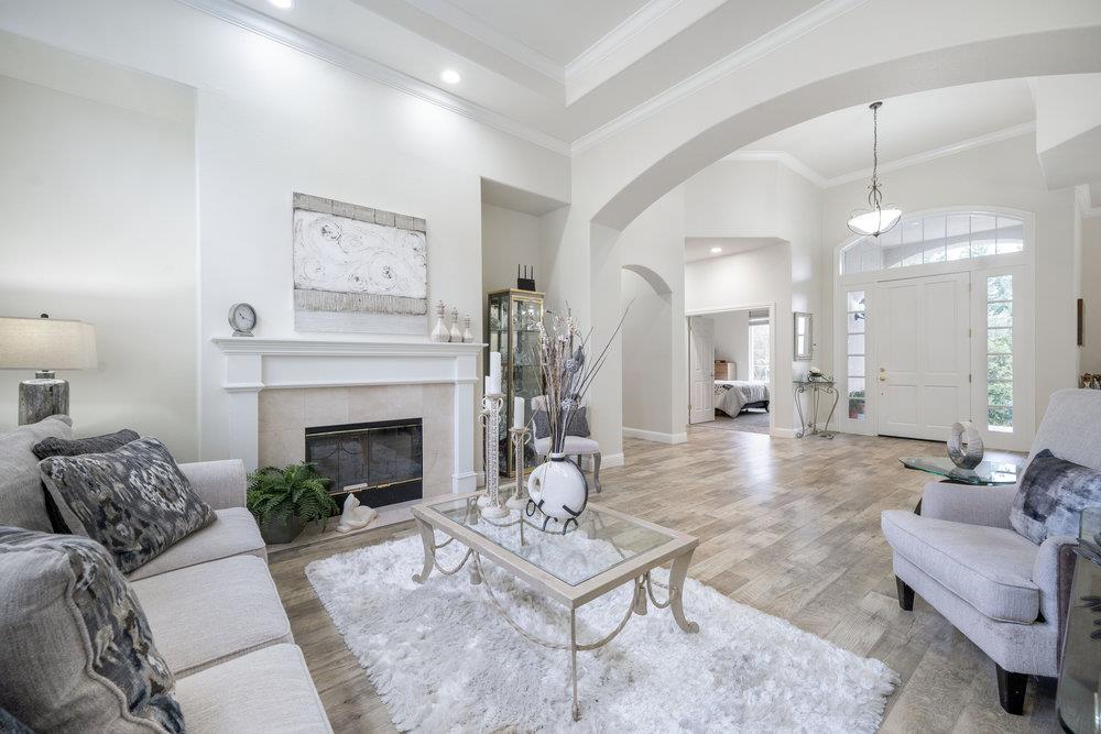 2360 Sunflower Circle Gilroy, CA 95020 - Photo 9 of 49 a living room with furniture and a fireplace