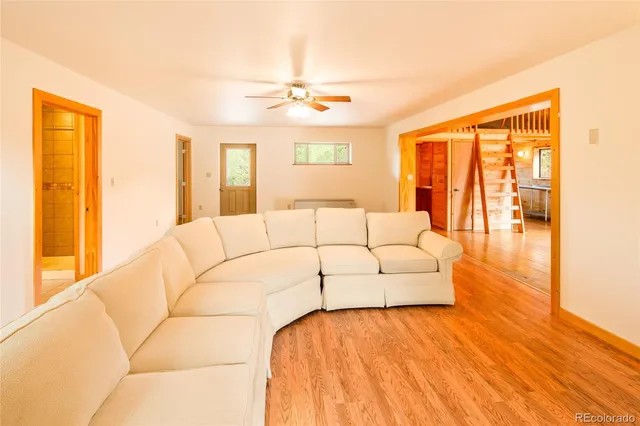 a view of front door with wooden floor
