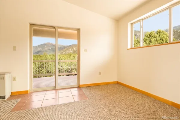 a view of a mountain from a balcony