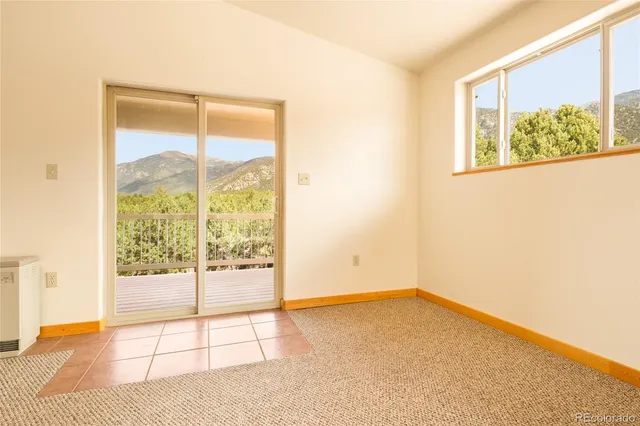 a view of a mountain from a balcony