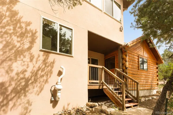a view of balcony with wooden floor