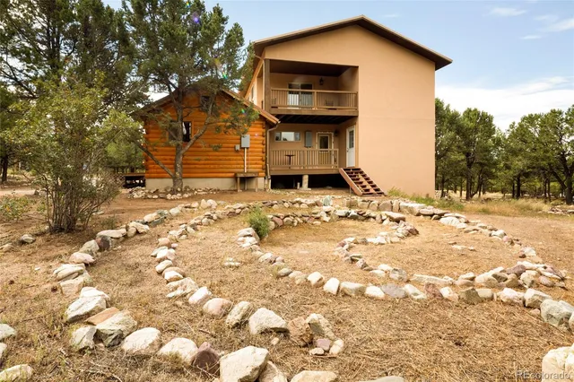 a view of a yard covered with snow